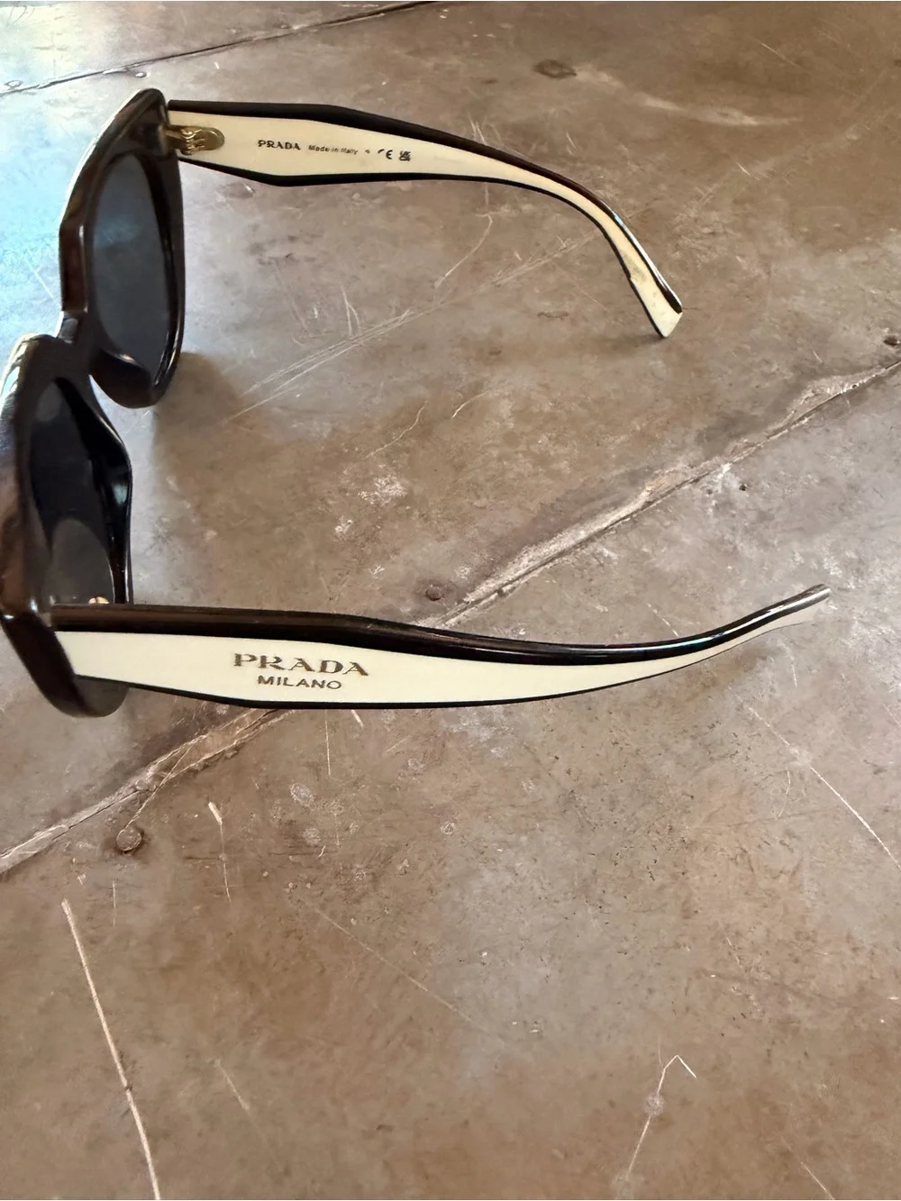 Prada Black Cat-Eye Sunglasses with Silver Temples
